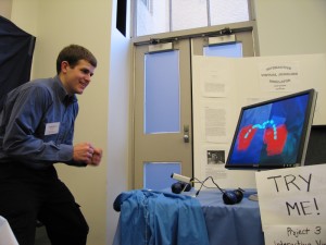 David demonstrates the Interactive Virtual Juggling Simulator at the course 6 project expo.